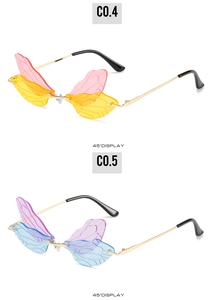 Detail of rimless dragonfly wing sunglasses with pink yellow and purple blue gradient lenses