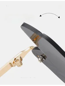 Detailed close-up of durable golden metal hinges on dragonfly wings sunglasses