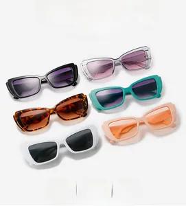 Detailed collection of narrow cat eye sunglasses in various trendy candy colors and patterns