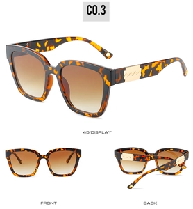 Three-angle views of vintage tortoiseshell square sunglasses with gold wave metal details