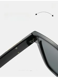 Detailed close-up of durable double-screw reinforced hinges on black sunglasses