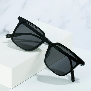Modern square polarized sunglasses for men with glossy black frame and dark grey lenses