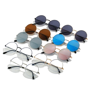 Collection of retro round metal sunglasses and clear lens glasses in various colors