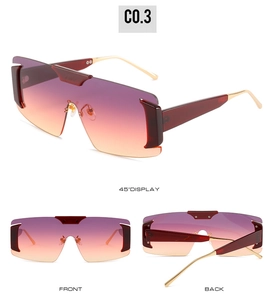 Oversized rimless shield sunglasses featuring gradient lenses and gold metal temples