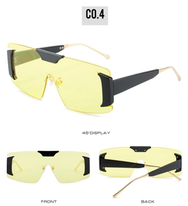 Detailed views of oversized sunglasses with yellow lenses and golden metal temples