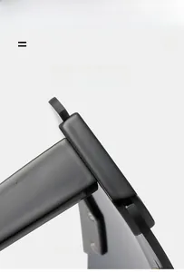 Macro view of high-gloss hinges and super elastic temple arms on black sunglasses