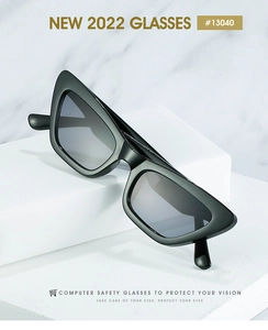 Detail of black cat-eye computer safety glasses with anti-blue light lenses and gloss finish