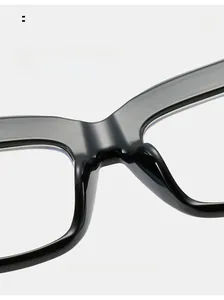 Close-up of integrated black acetate nose pads on oversized cat-eye glasses frames