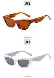 Detailed 45-degree angle display of vintage cat eye sunglasses in tortoise and white frames