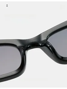 Macro detail of comfortable integrated nose pads on black cat-eye rectangle sunglasses