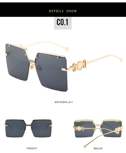 Detailed views of oversized square sunglasses with gold metal frames and grey lenses