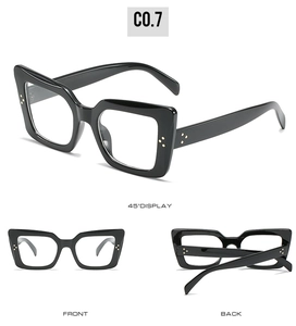 Multiple views of chunky black cat eye sunglasses featuring metallic rivet details