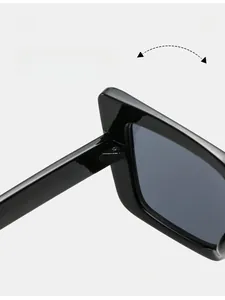 Macro detail of a durable metal hinge on stylish cat eye sunglasses with black frames
