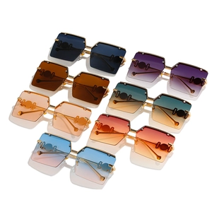 Variety of oversized square fashion sunglasses with colorful gradient lenses and gold metal arms