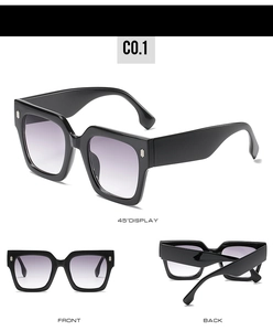 Detailed views of oversized square sunglasses with black frames and gradient lenses