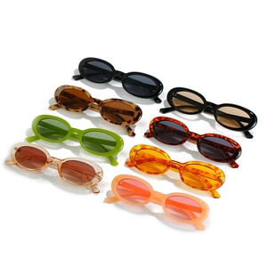 Retro oval sunglasses set in vibrant candy colors with thick frames for men and women