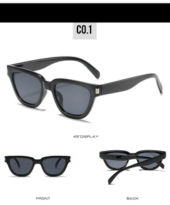 Detail view of black full-frame sunglasses with silver metal temple accents and dark lenses