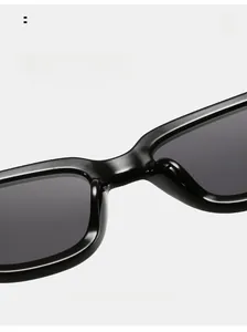 Detail of comfortable integrated nose pads on black thick frame sunglasses