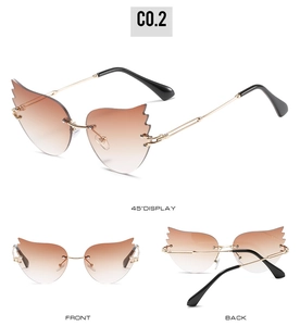 Détail de lunettes de soleil sans monture en forme de flamme avec verres dégradés