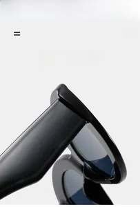 Detailed close-up of flexible glossy black cat eye sunglasses frame with durable hinges
