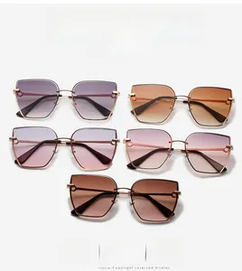 Collection of oversized rimless square sunglasses with gradient lenses and gold metal temples