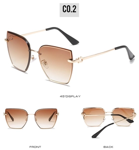 Three-angle view of rimless gradient brown sunglasses with gold Gancini-style hinges