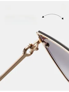 Close-up of durable metal texture hinges on rimless gradient lens sunglasses