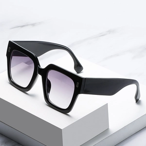Chic oversized square sunglasses with black frames and purple gradient lenses for women