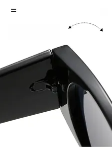 Macro detail of a durable metallic texture hinge on round oversized sunglasses