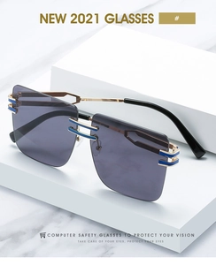 Close-up of square rimless gradient sunglasses with gold metal frame and blue accents