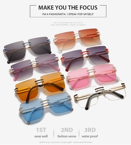 Detailed close-up showing multiple colorful square rimless sunglasses with metal temples