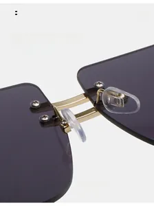Detail of comfortable silicone nose pads and sturdy metal hinges on rimless sunglasses
