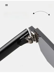 Macro detail of a durable silver metal hinge on sleek black minimalist sunglasses