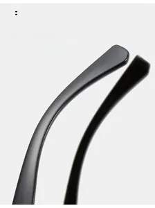 Detail of curved ergonomic temple arms on black sunglasses for a comfortable fit