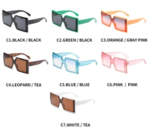 Collage of oversized square sunglasses in seven vibrant colors with thick frames