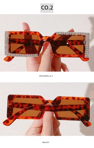Detail view showing 45-degree and back angle of leopard print sunglasses with rhinestones