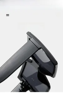 Detail shot of black square sunglasses hinges showing super elastic and light material