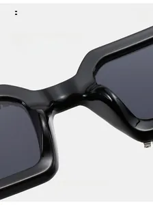 Detail of comfortable nose pads on black oversized sunglasses with premium frame finish