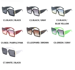 Close-up of square sunglasses collection with quilted temples and gold rivet details