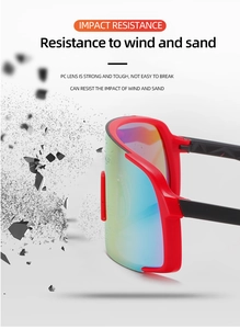 Close-up of impact-resistant PC lens on red cycling sunglasses with windproof feature