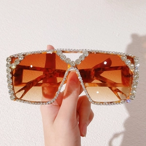 Oversized square sunglasses with leopard print frame and sparkling rhinestones