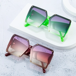 Fashion oversized square frame sunglasses with gradient lenses and stylish gold rivet studs
