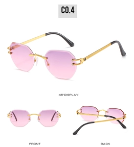 Detail view of rimless gradient purple sunglasses with textured gold metal temples