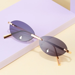 Schicke randlose Sonnenbrille mit lila Verlaufsgläsern und goldenem Metallgestell