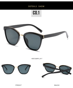 Three-angle views showing black frame with gold metal accents on retro sunglasses