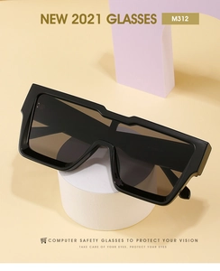 Detail view of model M312 black oversized square frame sunglasses with grey resin lenses