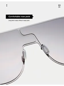 Détail des plaquettes en silicone et du pont argenté sur les lunettes de soleil sans monture