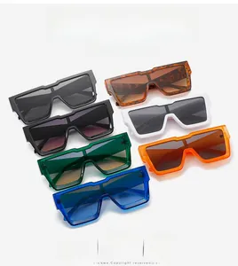 Flat lay of trendy oversized square sunglasses in seven vibrant colors and thick frames