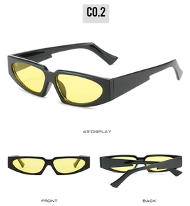 Macro detail of retro triangular sunglasses with yellow lenses and black glossy frames