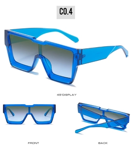 Three-way view of oversized square translucent blue sunglasses with gradient grey lenses